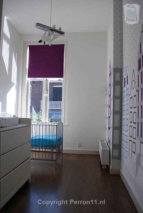 Kinderkamer grachtenpandjes vliegtuigen behang